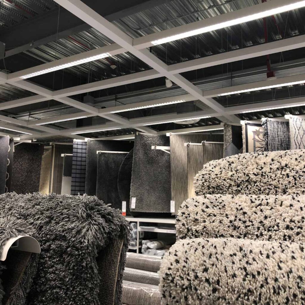 Carpets hanging in carpet store