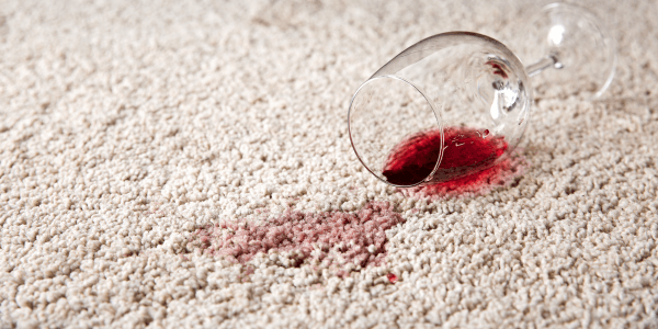 Glass of Wine Spilled on Carpet resulting in carpet stain